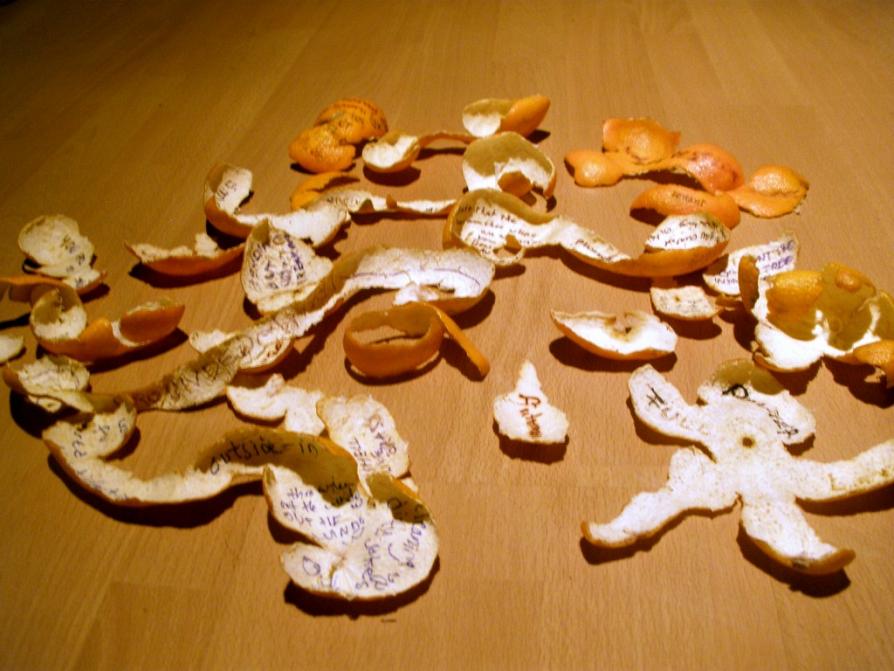 clementine peels with handwritten feedback from audience